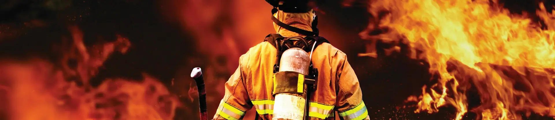Firefighter in front of fire Firefighter in front of fire